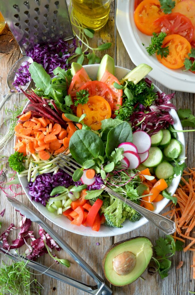 Fresh leafy greens and nutritious whole foods supporting gut health